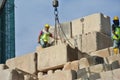 Construction workers stacking the maintain load test block at the construction site Royalty Free Stock Photo